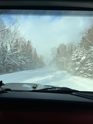 Customer's view from a car on a snowy road, showing the cold conditions where the Stella Leggings were worn.