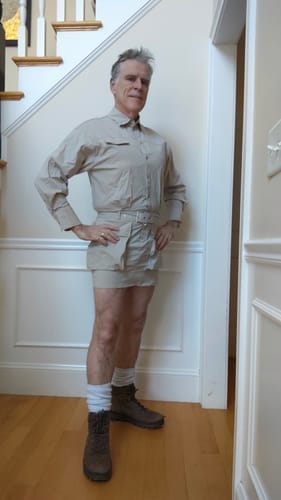 Reviewer wearing the khaki Skater Shirt Dress With Belt, posing with hands on hips indoors.