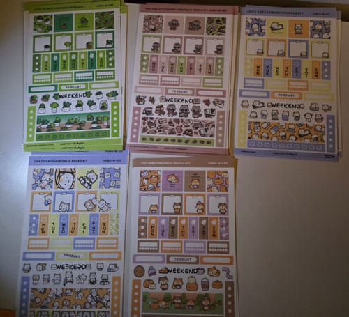 Customer's Autumn Foxes Theme Hobonichi Weeks Kit displayed with four other colorful sticker kits.