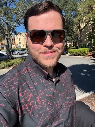 Reviewer outdoors wearing the black Lord of the Rings 'The World Is Changed' shirt.