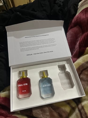 Customer's OUD Supreme BUNDLE in its open white box, showing the red Ora 1776 bottle and another fragrance.
