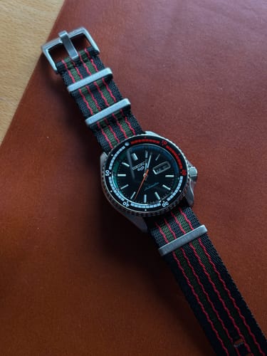 Customer's AlphaShark Vintage Bond strap on their Seiko watch, showing the shiny, striped nylon.