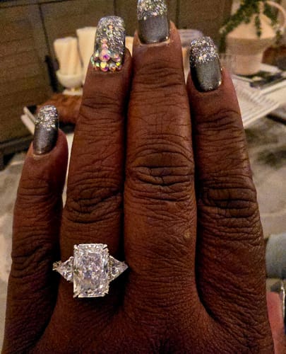 Customer photo review of 5.0 Carat Radiant Cut Three Stone Engagement Ring With Hidden Halo