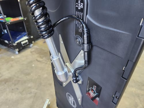 Close-up: Customer's cable management for the ElimaDent Fatty hail light v2, showing the cord attached to the silver mount.