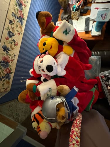 Customer's photo of stuffed Christmas stockings where they placed their SPOTMINDERS Tracking Cards.