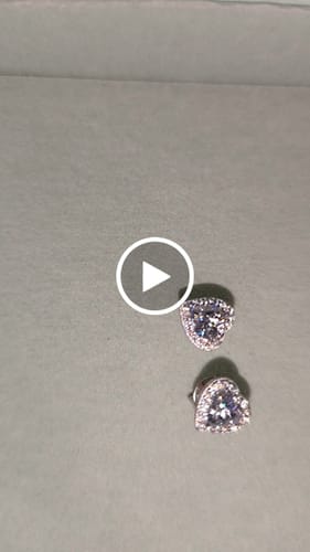 Customer video review of MOISSANITE BIG LOVE STUDS.