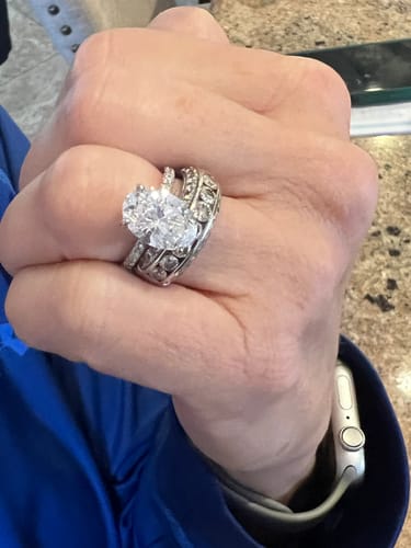 Customer photo review of 3.45 Carats Lab Grown Oval Cut Micropaved Side Stones Hidden Halo Diamond Engagement Ring