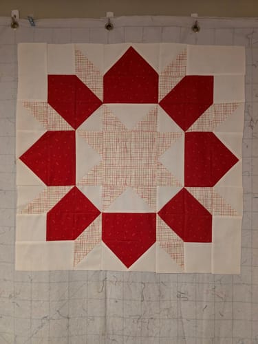 Customer photo review of Swoon Christmas Precut Sew-Ready Quilt Kit featuring Riley Blake Mistletoe & Holly