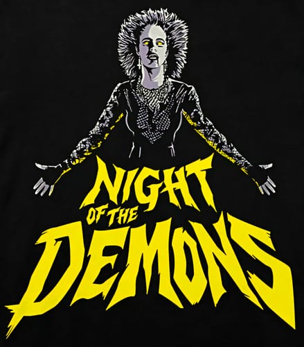 Close-up of the custom 'Night of the Demons' graphic on a customer's black unisex t-shirt.