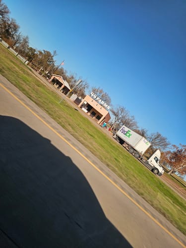 Customer's photo of the 44 Farms storefront from the highway, as mentioned in the review.