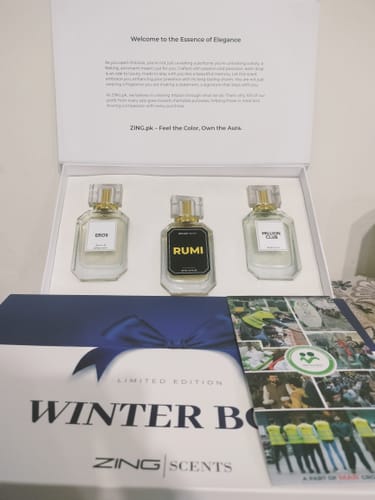 Customer's ZING perfume set showing three bottles: Eros, Rumi, and Million Club, neatly arranged in a white box.