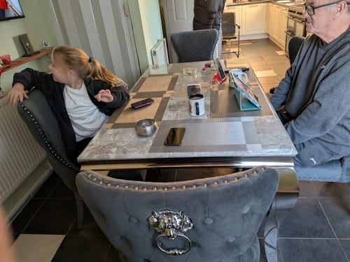 Customer photo review of Vienna Marble Dining Table With Lewis Lion Knocker Chairs