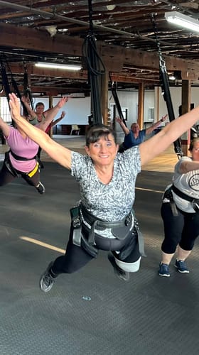 Reviewer in a bungee fitness class mentioned in their review. The calf sleeve is not visible in this image.