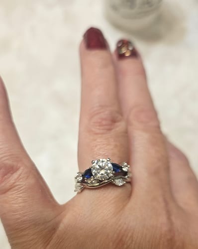 Customer photo review of Five Stone Moissanite And Sapphire Engagement Ring