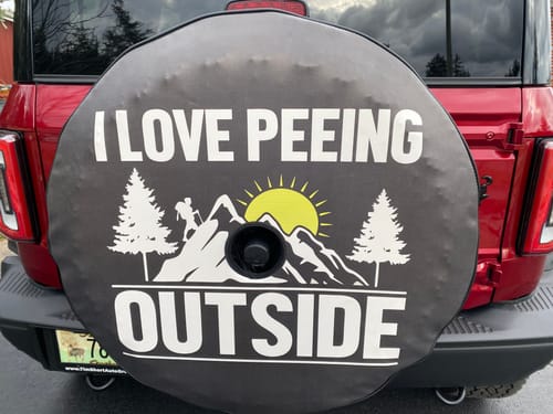 Customer photo review of I Love Peeing Outside Funny Spare Tire Cover for Jeep, RV, Bronco, Camper, & More