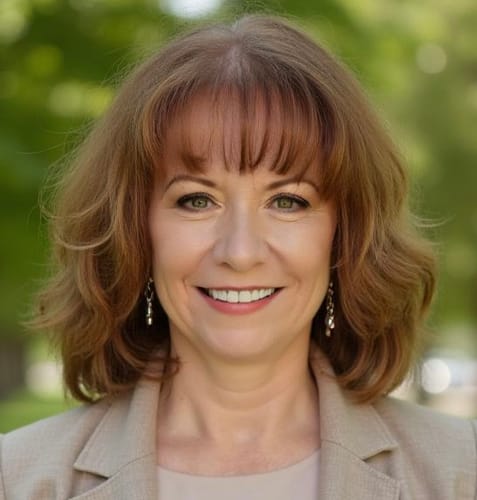 Reviewer with soft, glowing skin after using The Micro Infusion System.