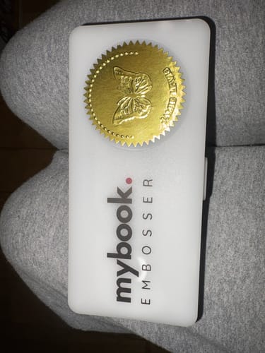 Customer photo review of My Book Embosser – Custom Book Embosser