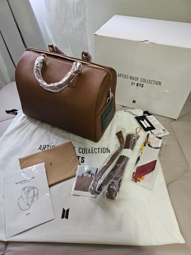 Customer's brown MUTE BOSTON BAG displayed with its box, dust bag, and accessories.