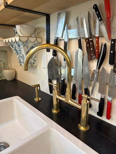Customer photo review of Unlacquered Brass Kitchen Bridge Faucet With Sprayer & Cross Handles