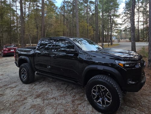 Customer's black Colorado Zr2 truck with a satin shine after being cleaned with the product.