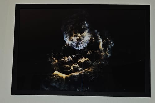 Customer's framed Falcon Flies with Grace print showing the Axiom 4 boostback nebula hanging on a wall.