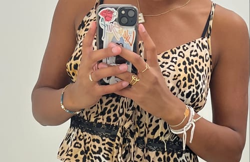 Customer wearing the elegant Turquoise Blue & Pearl Bead Bracelet, showing its perfect fit on their wrist.