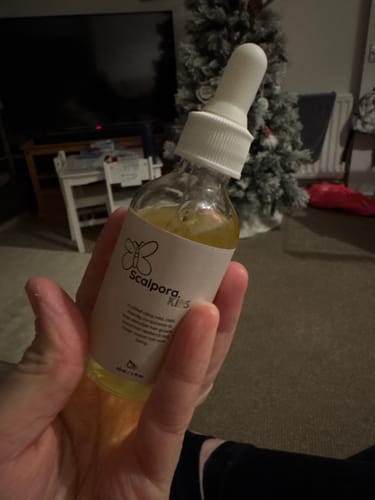 Customer photo review of Kids Hair Growth Oil