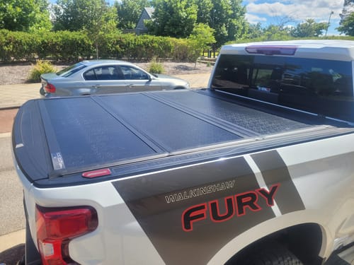 Customer photo review of Quad-Fold Hard Lid Tonneau Cover For Chevrolet Silverado 1500 2014-2025 - UniUte