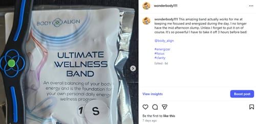 A customer's image showing the black and blue Ultimate Wellness Band next to its packaging, alongside their review post.