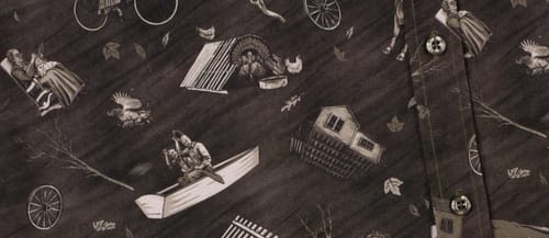 Customer's close-up of the sepia-toned 'Wicked Winds' shirt, showing the detailed pattern of characters in the tornado.