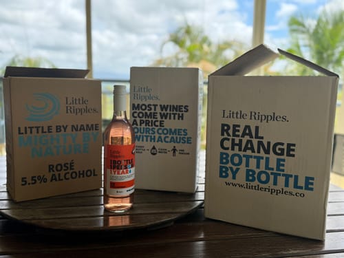 Customer's Little Ripples rosé wine bottle from the Chrissy GWP set displayed with its branded packaging boxes.