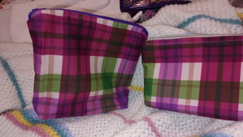 Reviewer's two finished bags made with the colorful plaid fabric from the DIY Bag Bundle.