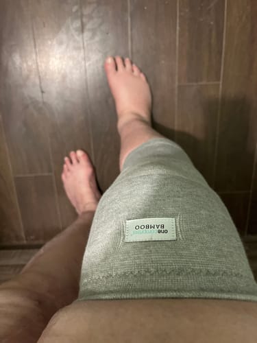 Customer's personal view wearing the grey Premium Bamboo Knee Sleeve on their knee.