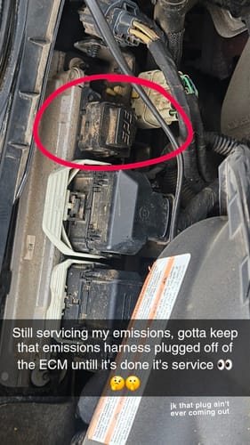 Customer's close-up of the SPE Emissions Harness Plug installed to seal the ECM in a Powerstroke engine.