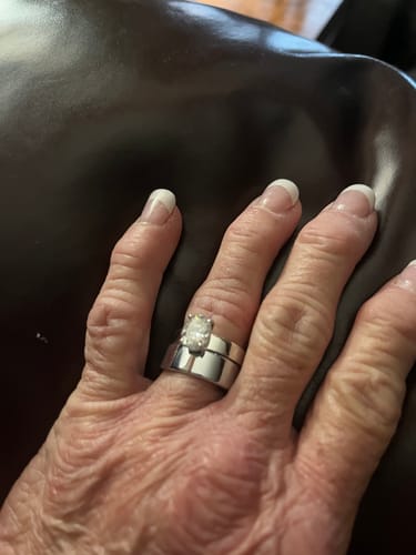 Customer photo review of Solitaire Oval Cut Moissanite Wide Band Engagement Ring