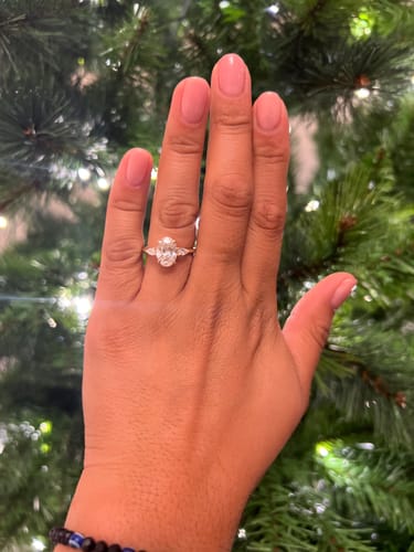 Customer photo review of 2.40 Carats Lab Grown Oval Cut with Pear Shape Side Stones Diamond Engagement Ring in Yellow Gold