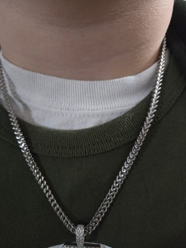 Close-up of a customer wearing the shiny 3mm Thin Franco Link Chain around their neck.