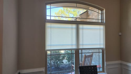 Customer photo review of SmartWings Motorized Light Filtering Roller Shades 70% Blackout Essential