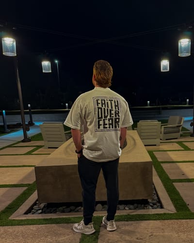 Customer photo review of Faith Over Fear Tee