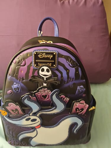 Customer photo review of Loungefly Disney The Nightmare Before Christmas Zero Graveyard Light Up Mini Backpack