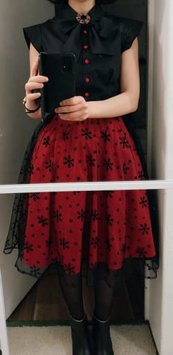 Customer photo review of Red & Black 1950s Christmas Tie Bow Mesh Dress