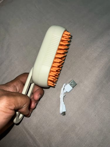 Customer photo review of Cat Steamy Brush – Grooming & Massage Tool for Pets