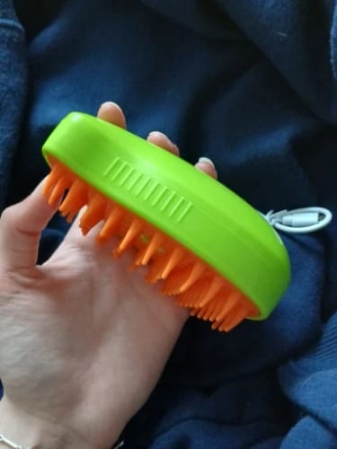 Customer photo review of Cat Steamy Brush – Grooming & Massage Tool for Pets