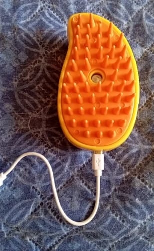 Customer photo review of Cat Steamy Brush – Grooming & Massage Tool for Pets