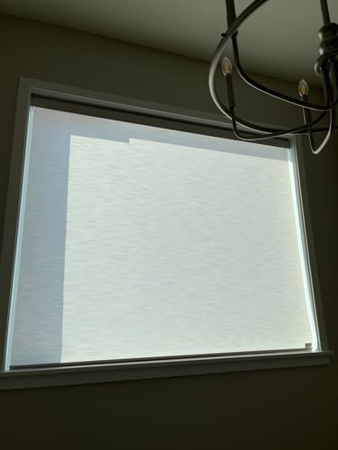 Customer photo review of SmartWings Motorized Light Filtering Roller Shades 70% Blackout Essential