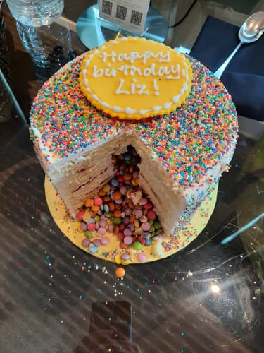 Customer photo review of Pinata Cake