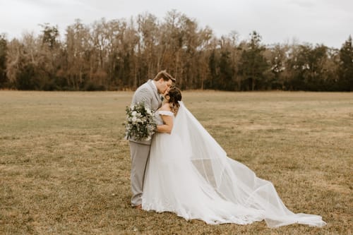 Customer photo review of Two Tier Veil with Beaded Edge: Fingertip, Chapel & Cathedral Length - ABERNATHY