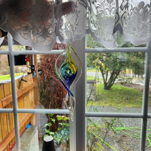 Customer photo review of Dichroic Spinner Suncatcher with Infused Cremains