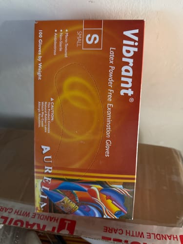 Customer photo review of Aurelia Vibrant Disposable Latex Gloves (Case of 10)