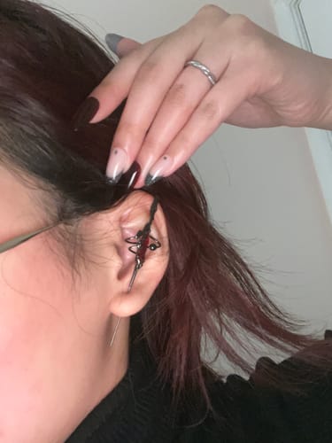 Customer photo review of "Star Trails" Platinum Plated Celestial Moissanite Long Chain Dangle Threader Earring